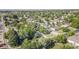 Extensive aerial view of the community featuring mature trees and single-Gathering homes at 2260 Lilly Dr, Thornton, CO 80229