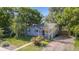 Charming single-story home with a well-maintained lawn and mature trees at 2260 Lilly Dr, Thornton, CO 80229