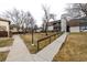 Apartment complex with walkways and grass at 7250 Eastmoor Dr # 105, Denver, CO 80237