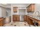 Updated kitchen featuring stainless steel appliances and ample counter space at 7250 Eastmoor Dr # 105, Denver, CO 80237