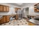 Spacious kitchen featuring stainless steel appliances and granite countertops at 7250 Eastmoor Dr # 105, Denver, CO 80237