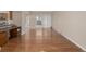 Bright living room with hardwood floors and sliding door access to the outdoors at 7250 Eastmoor Dr # 105, Denver, CO 80237