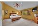 Spacious bedroom with vaulted ceilings, large windows, and wood accents at 28065 Camel Heights Cir, Evergreen, CO 80439