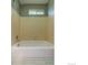 Bathroom with a white bathtub and updated fixtures at 10560 W 102Nd Pl, Broomfield, CO 80021