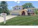 Charming two-story home with a well-manicured front yard and inviting entrance at 10560 W 102Nd Pl, Broomfield, CO 80021