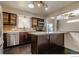 Well-lit kitchen with sleek stainless steel appliances, and a functional design at 10560 W 102Nd Pl, Broomfield, CO 80021