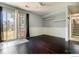 Open concept living room showing a back yard view and hardwood floors at 10560 W 102Nd Pl, Broomfield, CO 80021