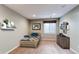 Finished bedroom features carpet, twin bed, shelving, and window at 12388 E Caspian Dr, Aurora, CO 80014