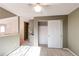 Bright bedroom with a large closet, neutral walls, and carpet flooring at 12388 E Caspian Dr, Aurora, CO 80014