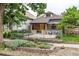 Inviting home exterior with a well-maintained front yard, plants, and inviting entrance at 30 Fox St, Denver, CO 80223