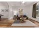 Charming living room features a comfortable seating arrangement and lots of space at 30 Fox St, Denver, CO 80223