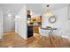 Cozy dining area with modern light fixture and seating for four at 252 N Pennsylvania St # 305, Denver, CO 80203