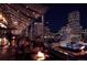 Outdoor rooftop patio with fire pit and city views at night at 252 N Pennsylvania St # 305, Denver, CO 80203