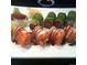 Close up shot of a beautifully plated sushi entree at 252 N Pennsylvania St # 305, Denver, CO 80203