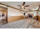 Spacious finished basement featuring carpeting, wood trim, and brick fireplace at 1824 S Granby St, Aurora, CO 80012