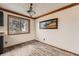 Cozy dining area featuring wood-look floors and a large window at 1824 S Granby St, Aurora, CO 80012
