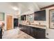 Modern kitchen with stainless steel appliances, granite countertops, and ample cabinet space at 1824 S Granby St, Aurora, CO 80012
