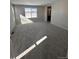 Spacious bedroom with windows, neutral paint and carpet at 393 Grey Rock St, Brighton, CO 80601