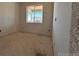 Bright bedroom with a window and neutral walls at 393 Grey Rock St, Brighton, CO 80601