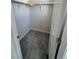 Bright walk-in closet with shelving and hanging space for organized storage at 393 Grey Rock St, Brighton, CO 80601