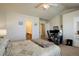 Spacious bedroom with a computer desk and an en suite bathroom at 4120 E 119Th Pl # B, Thornton, CO 80233