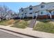 Desirable townhomes with inviting stairs, beautiful landscaping, and a friendly neighborhood ambiance at 4120 E 119Th Pl # B, Thornton, CO 80233