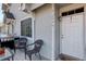 Cozy front porch featuring a grill, seating, and a welcoming entrance to the home at 4120 E 119Th Pl # B, Thornton, CO 80233
