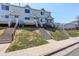 Charming townhomes feature well-kept lawns, inviting staircases, and a peaceful neighborhood setting at 4120 E 119Th Pl # B, Thornton, CO 80233