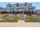 Inviting townhomes with well-maintained landscaping, charming stairs, and a fresh, modern appeal at 4120 E 119Th Pl # B, Thornton, CO 80233