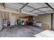 Spacious garage with concrete flooring and shelving for storage at 4120 E 119Th Pl # B, Thornton, CO 80233