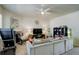 Spacious living area with a fireplace, a comfortable sectional, and a ceiling fan at 4120 E 119Th Pl # B, Thornton, CO 80233