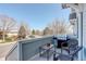 Relaxing porch view with outdoor seating, a grill, and a serene neighborhood setting at 4120 E 119Th Pl # B, Thornton, CO 80233