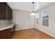 Breakfast nook featuring hardwood floors and natural light from large windows at 11010 Grayledge Cir, Highlands Ranch, CO 80130