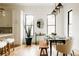 Elegant dining room with modern lighting, large windows, and open concept at 1016 28Th St, Denver, CO 80205