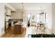 Open-concept kitchen featuring stainless steel appliances, an island, and lots of natural light at 1016 28Th St, Denver, CO 80205