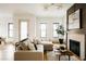 Comfortable living room featuring a stylish fireplace and modern decor at 1016 28Th St, Denver, CO 80205