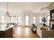 Bright, open-concept living area with hardwood floors, lots of natural light and modern decor at 1016 28Th St, Denver, CO 80205