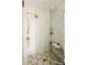 Luxurious walk-in shower with stylish tile, glass enclosure, and sleek fixtures at 1016 28Th St, Denver, CO 80205