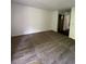 Spacious living room with neutral carpet and white walls, ready for your personal touch and design at 14852 E Kentucky Dr # 934, Aurora, CO 80012