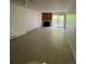 Spacious living room with a cozy fireplace and sliding glass doors leading to a balcony at 14852 E Kentucky Dr # 934, Aurora, CO 80012