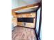 Mailroom in a condo complex featuring mailboxes, wood-paneled walls, and natural light from large window at 14852 E Kentucky Dr # 934, Aurora, CO 80012