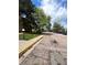 A view down the street showing ample parking and mature trees surrounding the condos at 14852 E Kentucky Dr # 934, Aurora, CO 80012