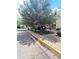 Serene condo street view surrounded by mature trees and beautiful landscaping at 14852 E Kentucky Dr # 934, Aurora, CO 80012