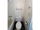 Toilet with adjacent bathtub and tilework, offering practicality and essential amenities in bathroom at 14852 E Kentucky Dr # 934, Aurora, CO 80012