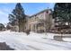 Two-story apartment building with balconies and landscaped surroundings, showcasing appealing architecture and outdoor spaces at 9567 Brentwood Way # A, Broomfield, CO 80021