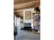 Open-concept dining area with hardwood floors and unique architectural details, providing comfortable living at 3605 W Berry Ave, Littleton, CO 80123