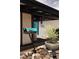 Exterior view showcasing a modern mailbox, gravel pathway and manicured shrubbery at 3605 W Berry Ave, Littleton, CO 80123
