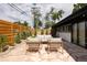 Inviting stone patio with comfortable seating for outdoor relaxation and entertaining at 3605 W Berry Ave, Littleton, CO 80123