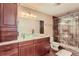 Modern bathroom with glass shower, granite vanity, and updated fixtures at 9850 Sunset Hill Circle Cir, Lone Tree, CO 80124