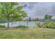 Community tennis courts with surrounding fence at 9850 Sunset Hill Circle Cir, Lone Tree, CO 80124